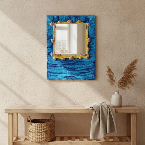 Artistic Hand-crafted functional mirror using eco-friendly materials with blue textured frame on a beige wall above a wooden bench.